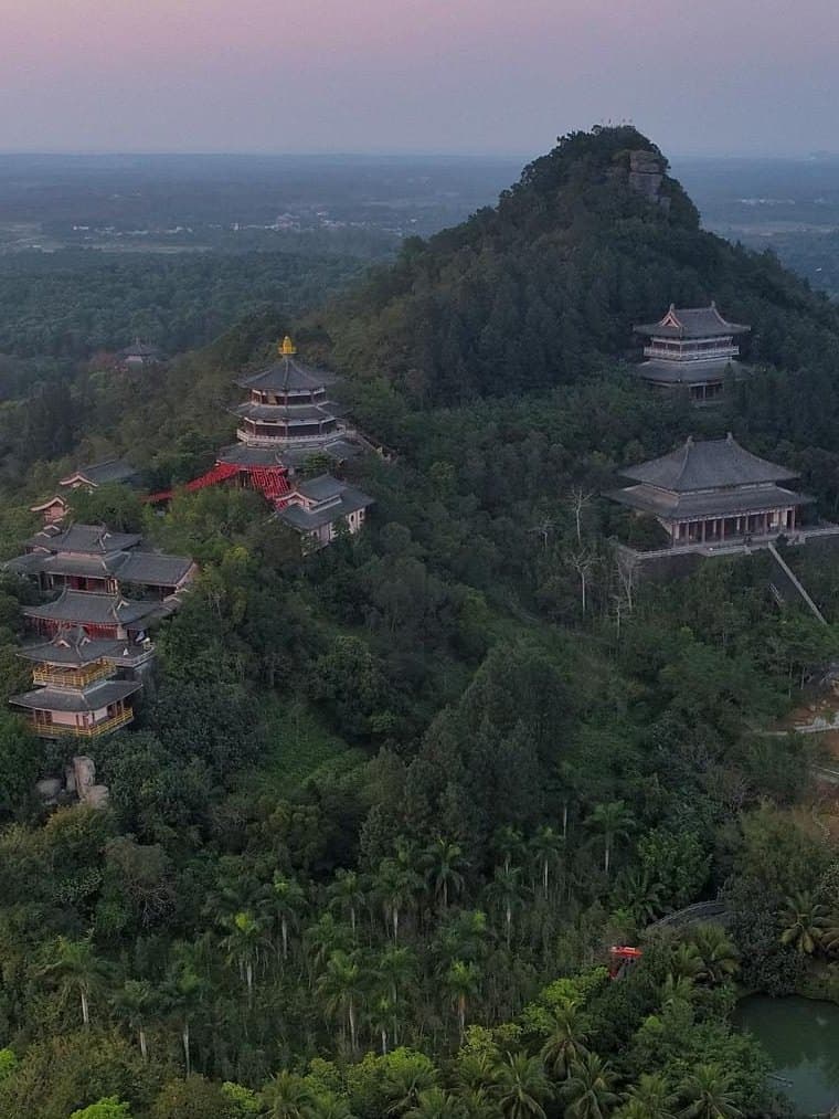 Wenbi Mountain on Hainan: the pavilions of Yuchan Palace on its slope, from the air